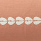 cowrie embroidered lumbar pillow cover in sandalwood