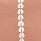 cowrie embroidered pillow in sandalwood
